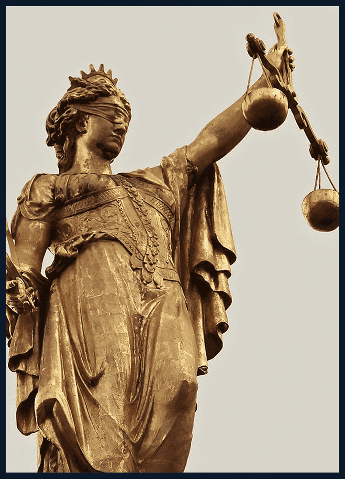 Golden Themis holding the scales of justice